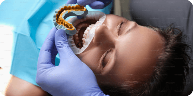 person's teeth being removed