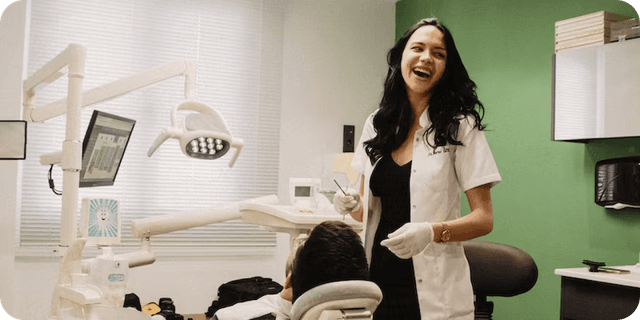 dentist smiling with patient